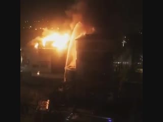 in vladivostok, a shopping center caught fire.